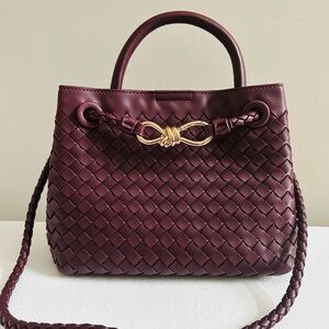 Burgundy woven handbag